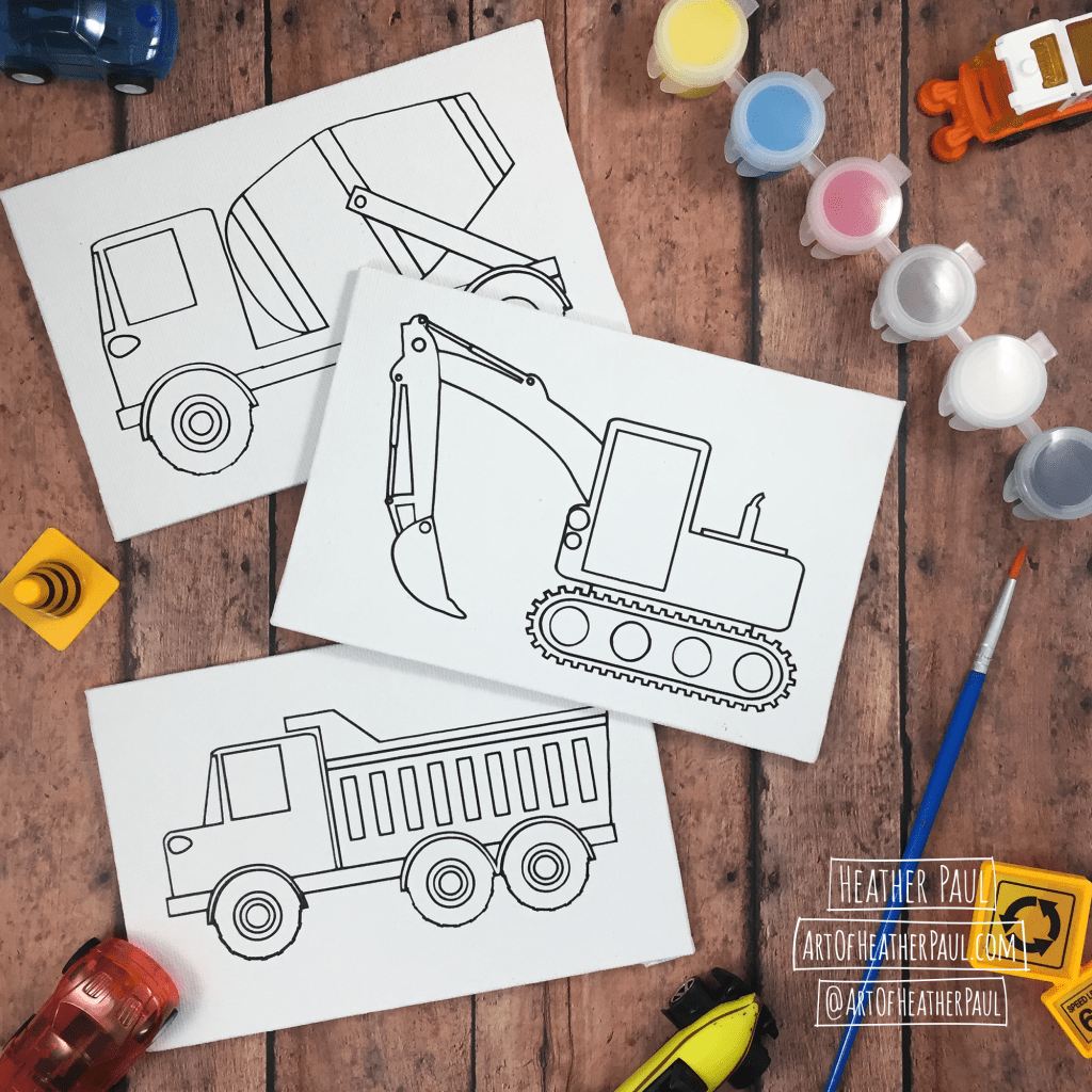 Image: Three small canvases featuring construction vehicles. Surrounding the canvases are various toys, a paint brush, and paint pods.